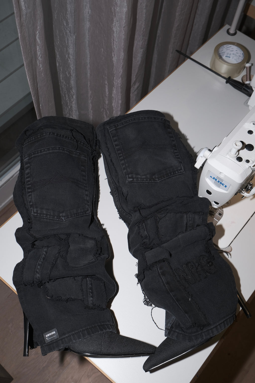 BLACK BUTTON UP PATCH WORK BOOTS